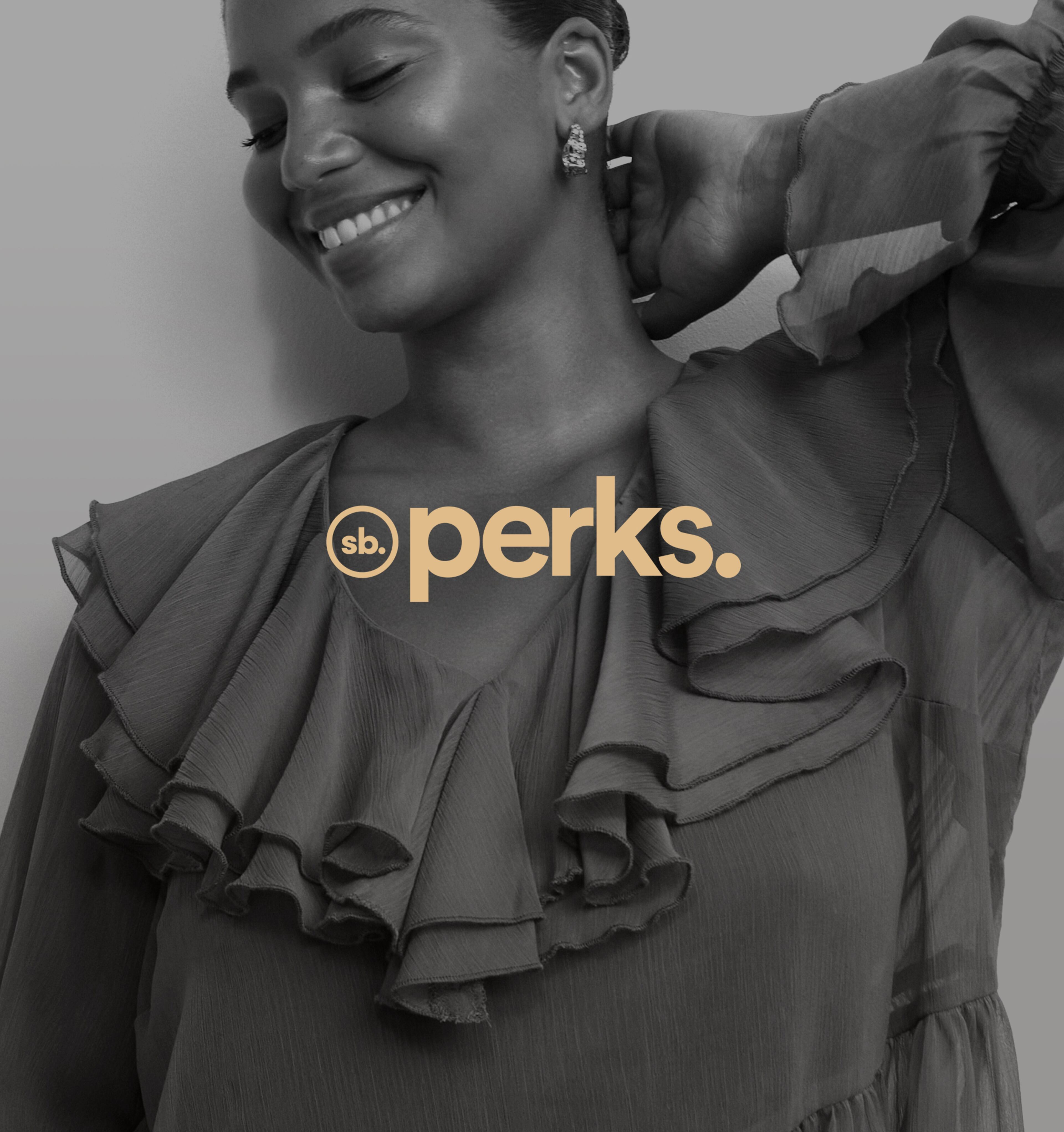 Simply Be Perks. Model wears Ruffle Blouse.