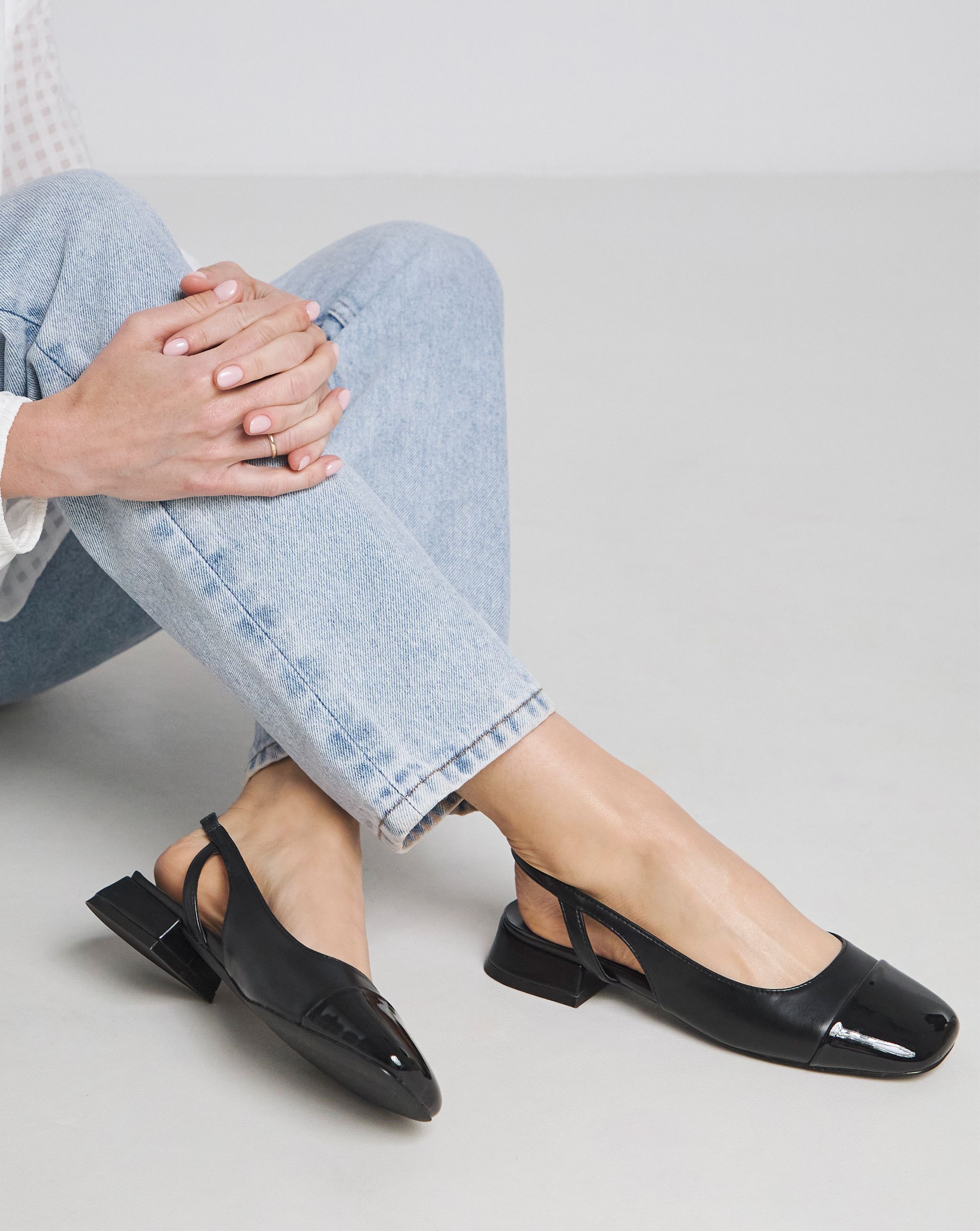 Black patent ballerinas