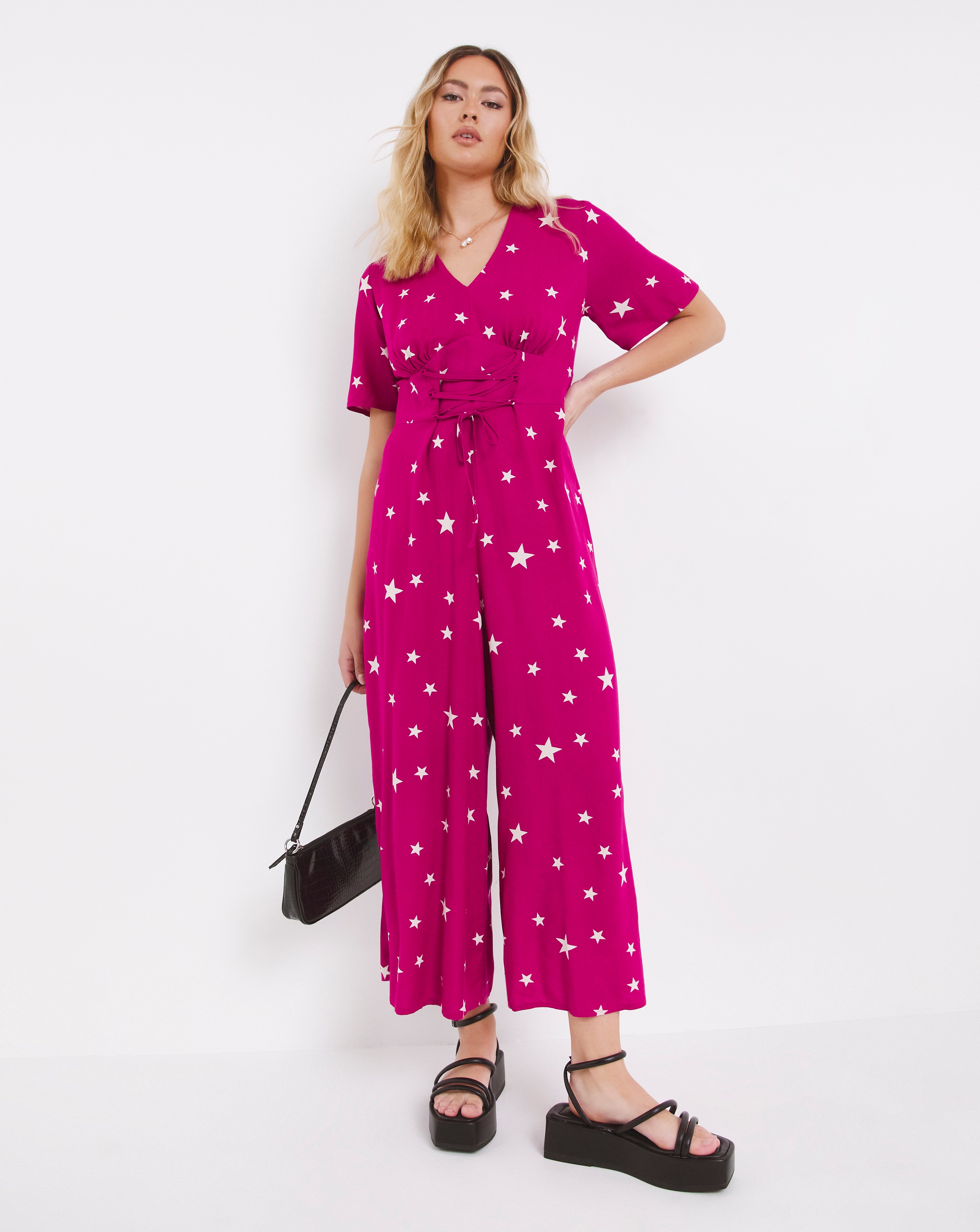 Star print jumpsuit hotsell