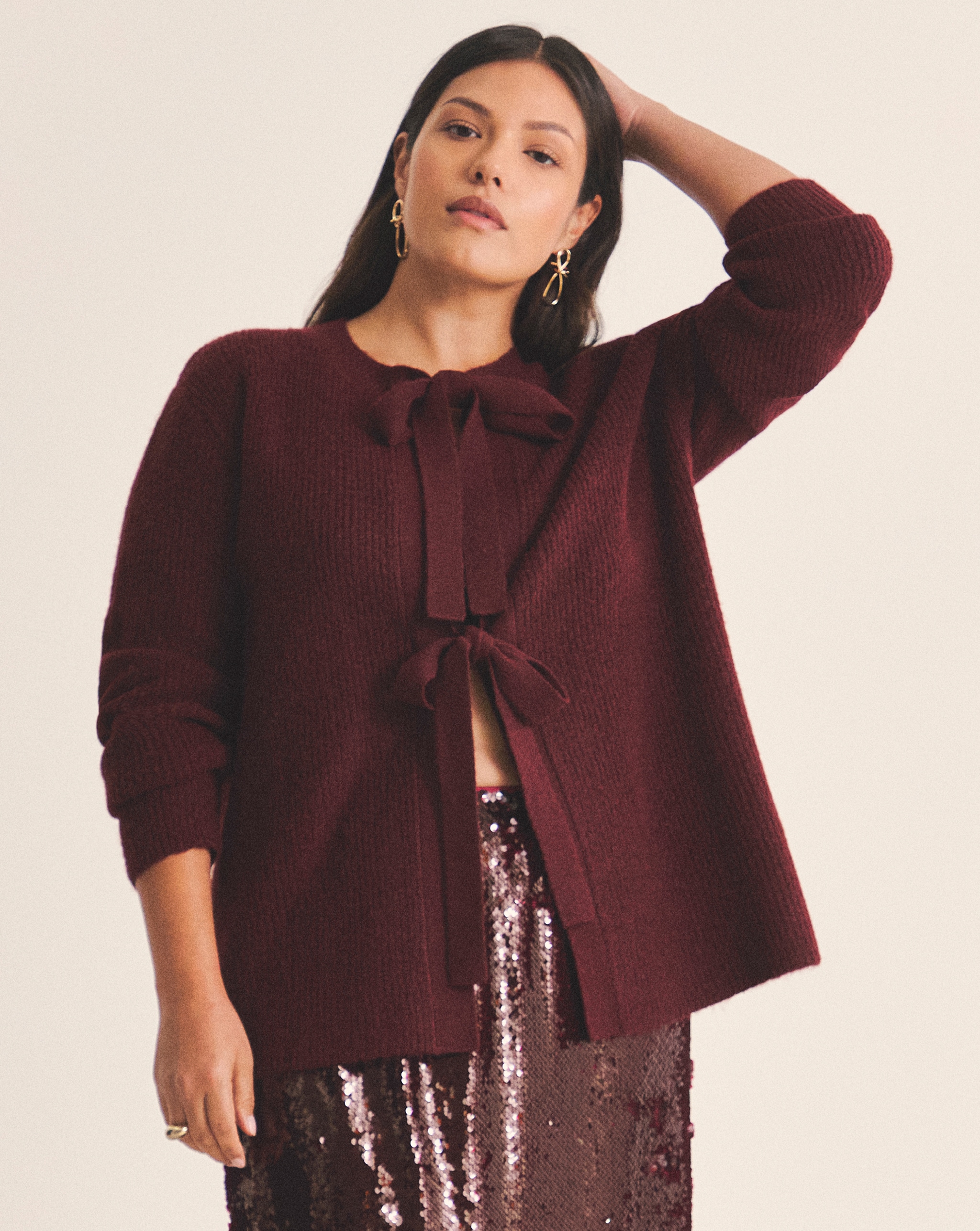 Model wearing Cosy Yarn Wine Pink Tie Front Bow Cardigan