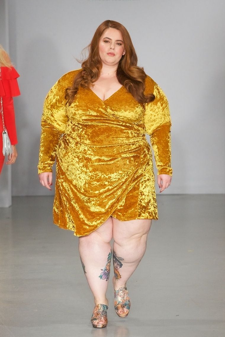 Tess Holliday in a gold dress