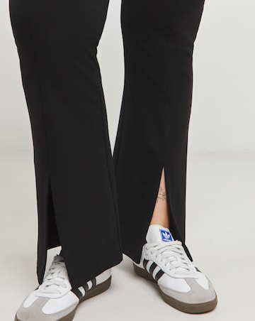 Black Ponte Skinny Split Hem Leggings