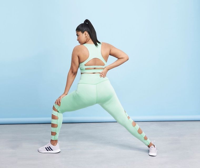 model lunging to the side