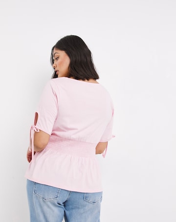 Tie Front Shirred Waist Peplum Top