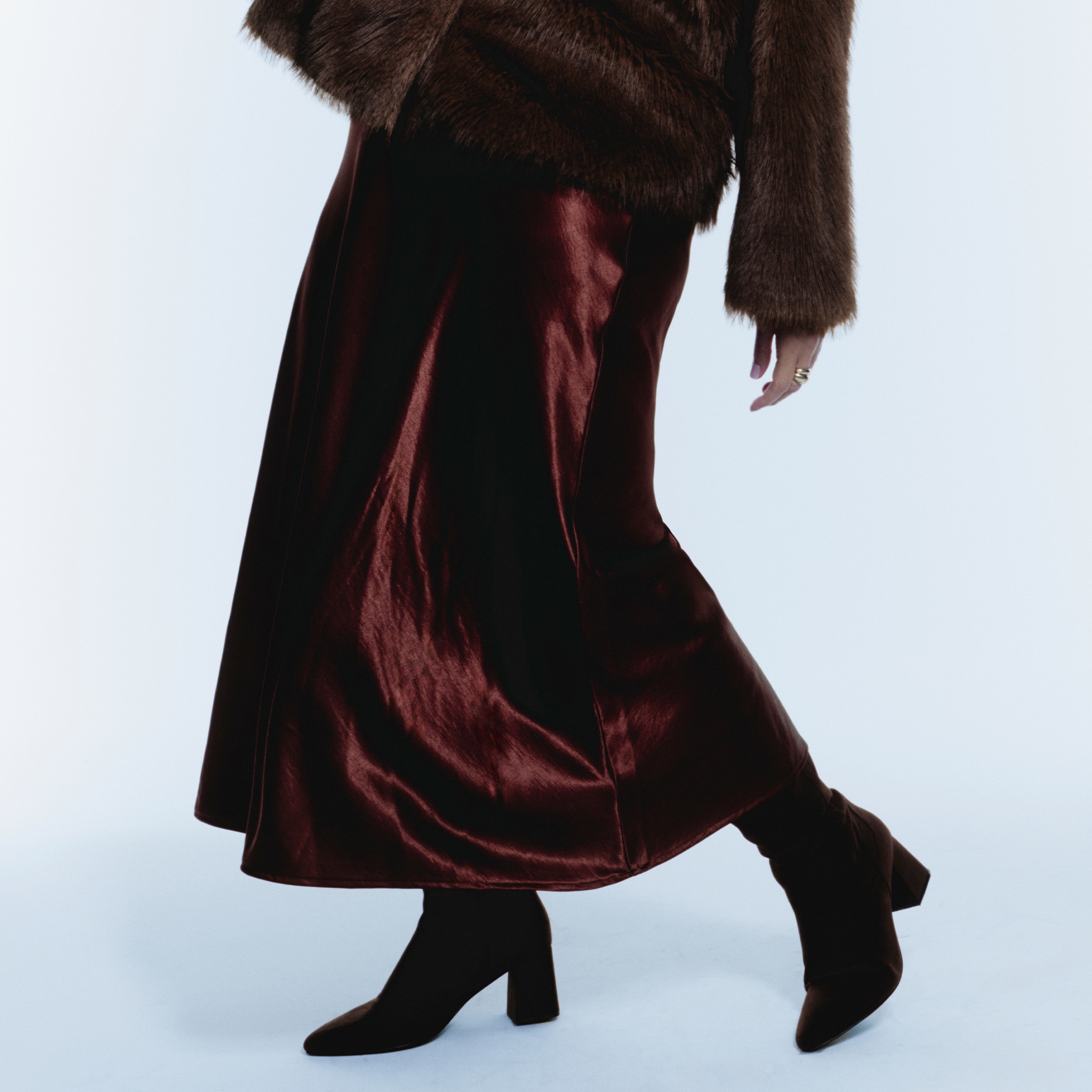 model wearing brown skirt