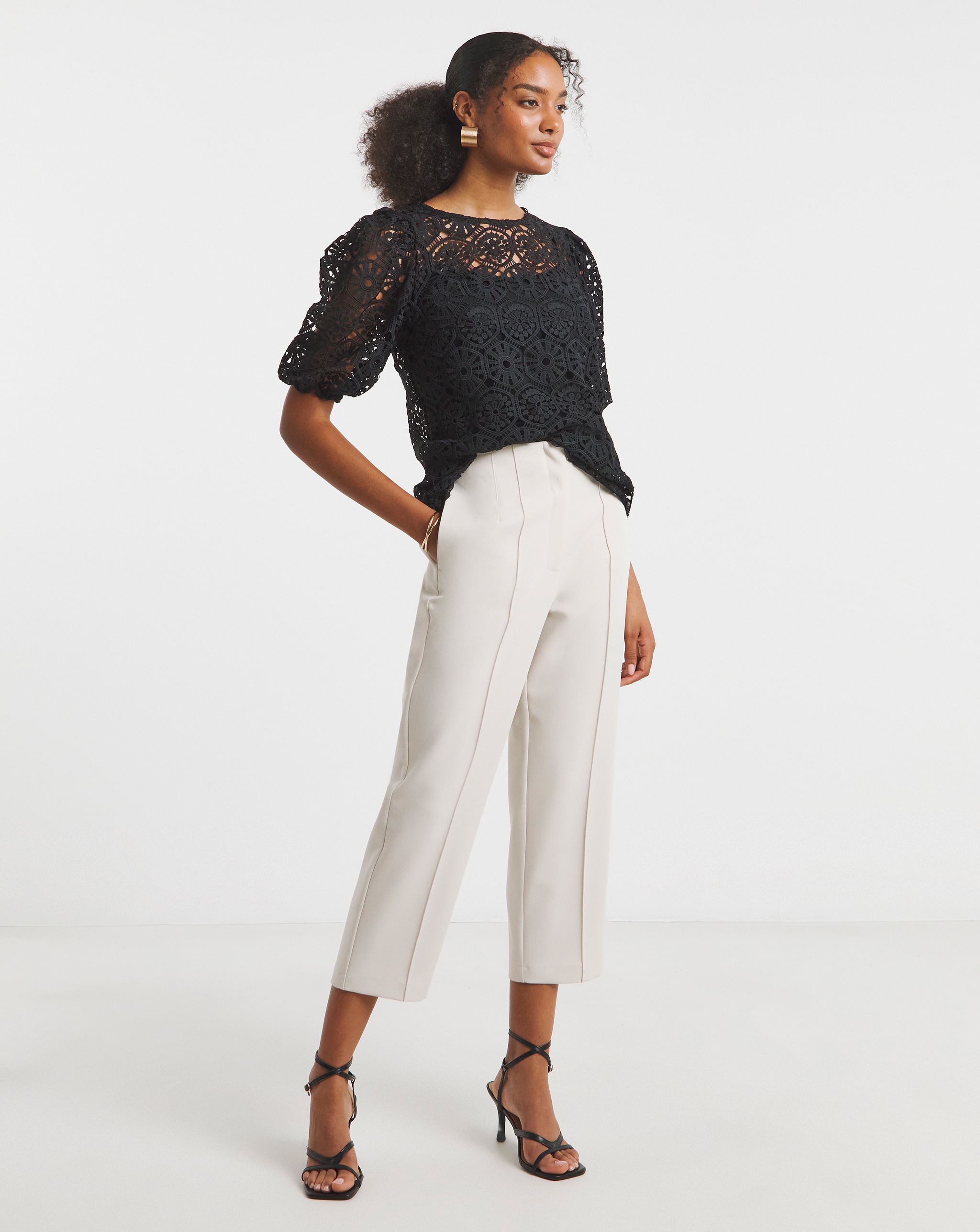 Crochet top and tailored trousers