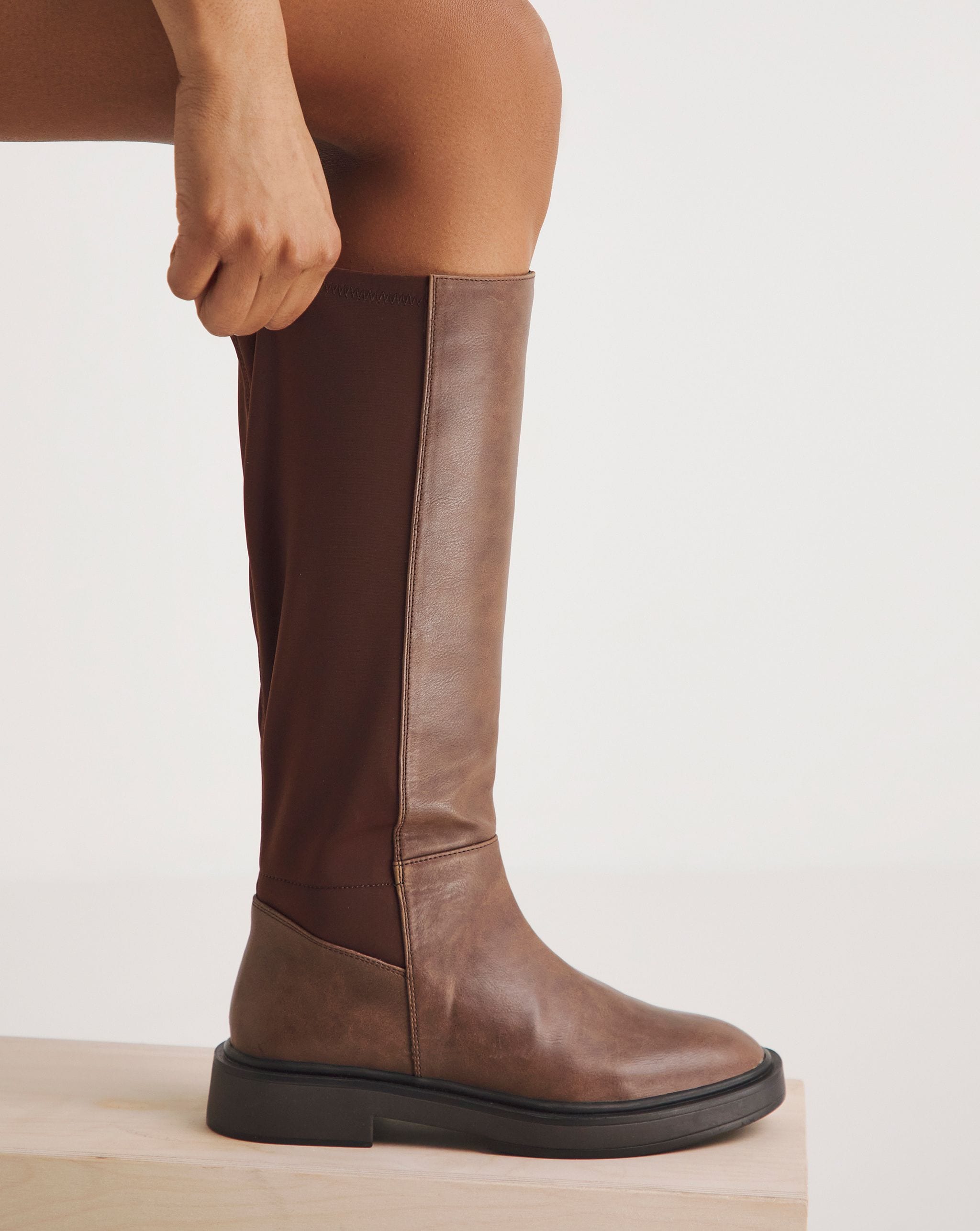Calf boot with elasticated back panel