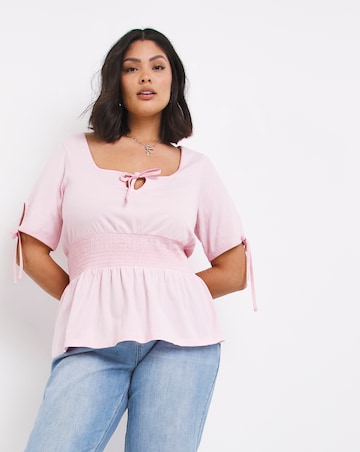 Tie Front Shirred Waist Peplum Top