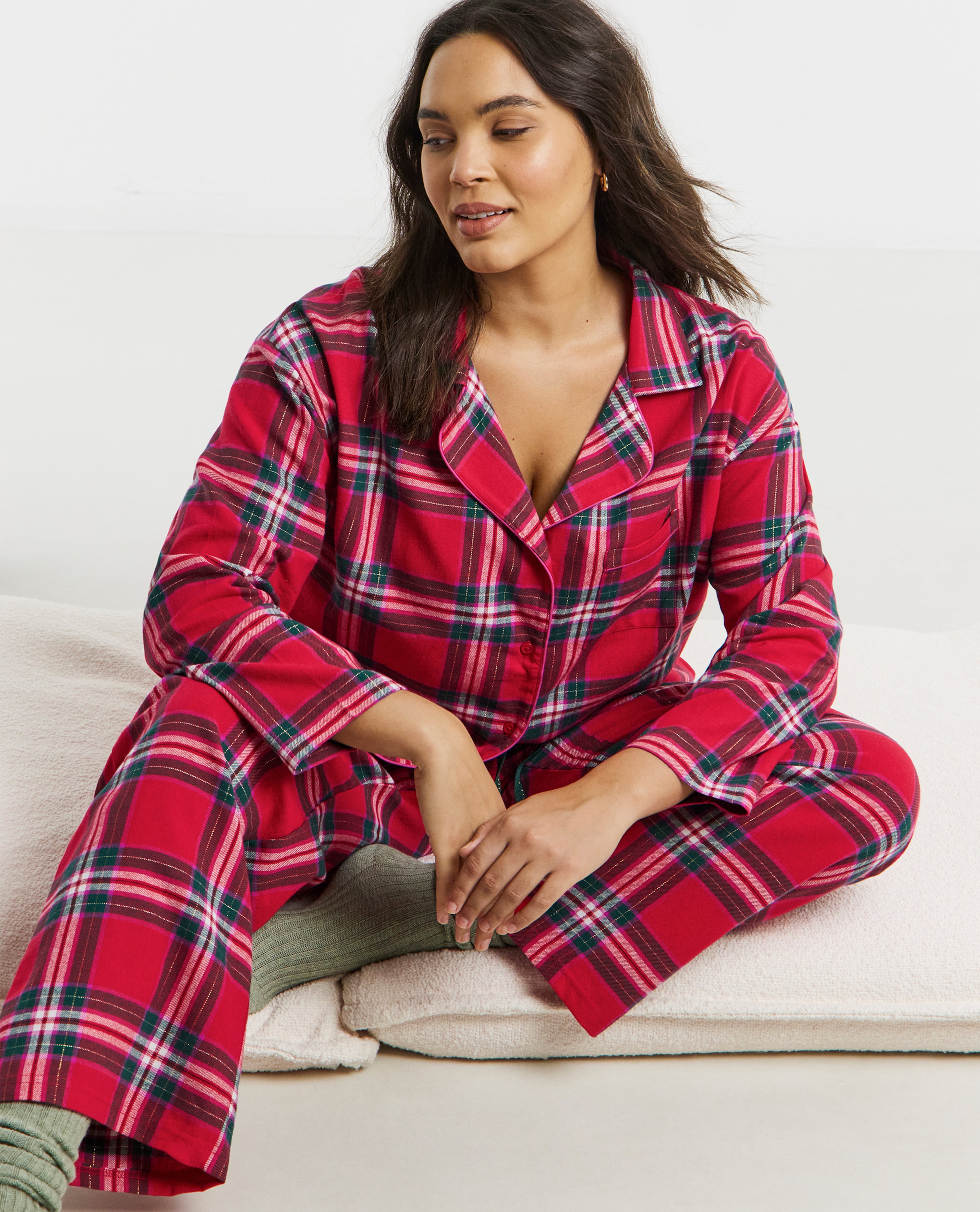 Model wears red check pyjama set