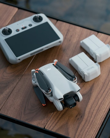 DJI Mini 3 Drone (with RC Remote Controller)