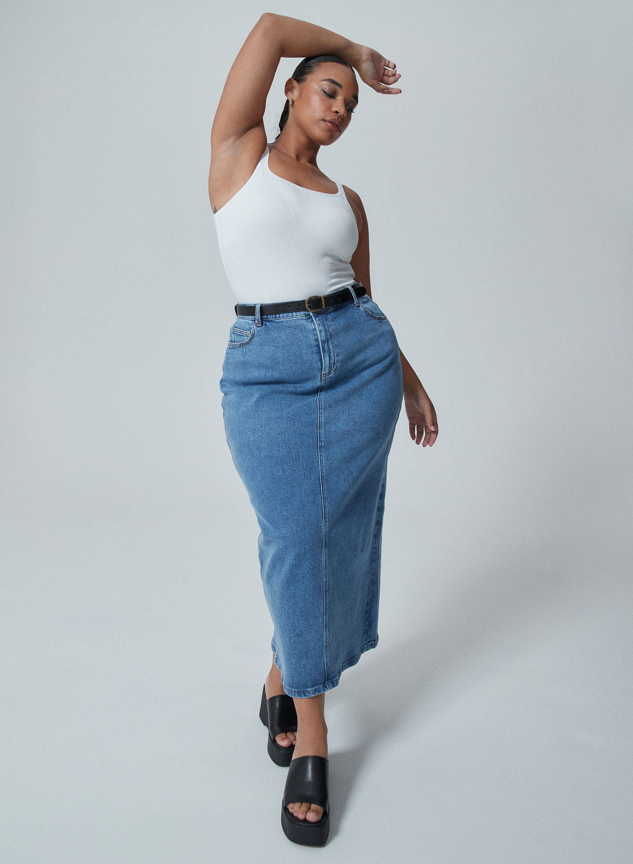 Model wearing new season denim skirt
