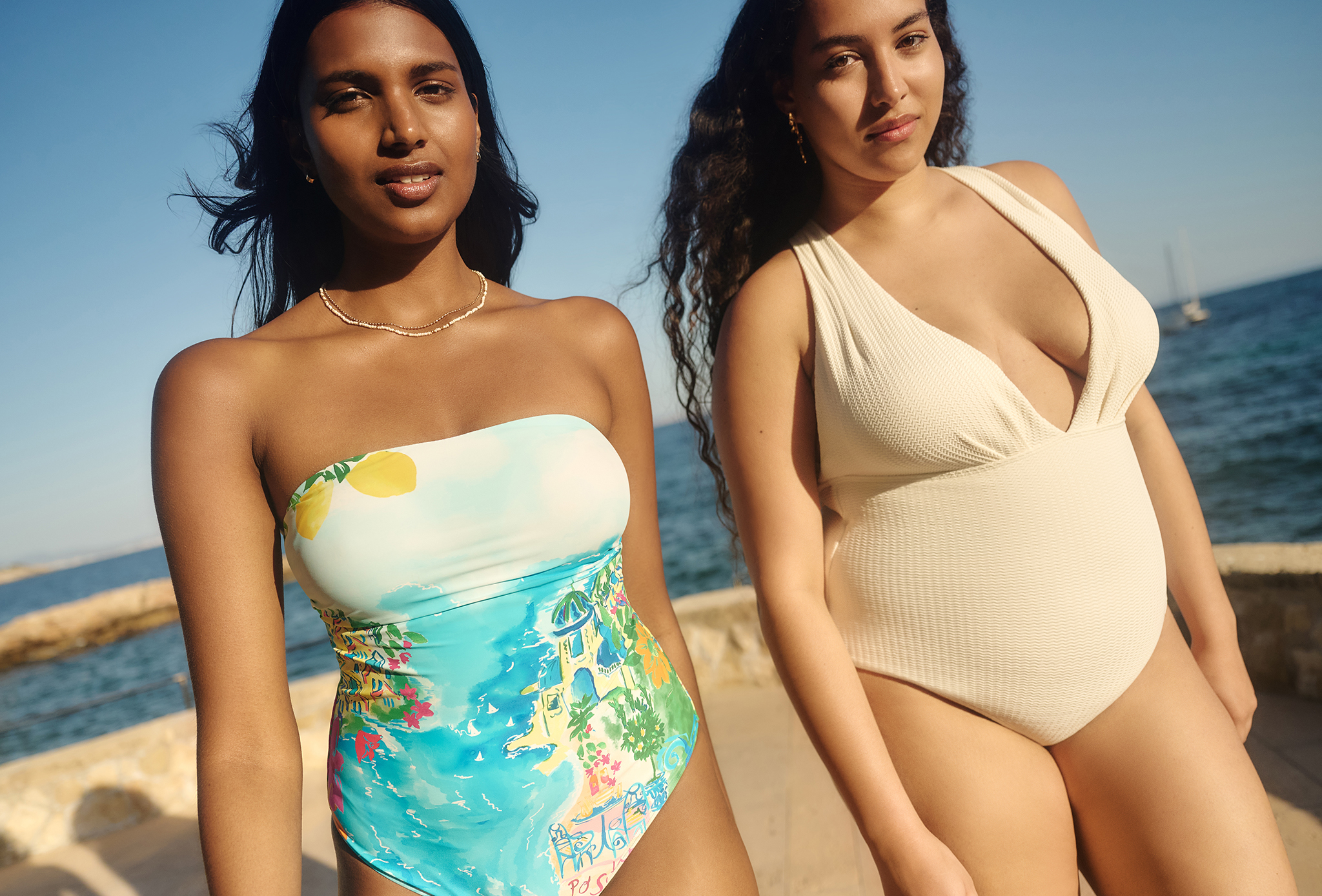 Two models wear new season swimwear