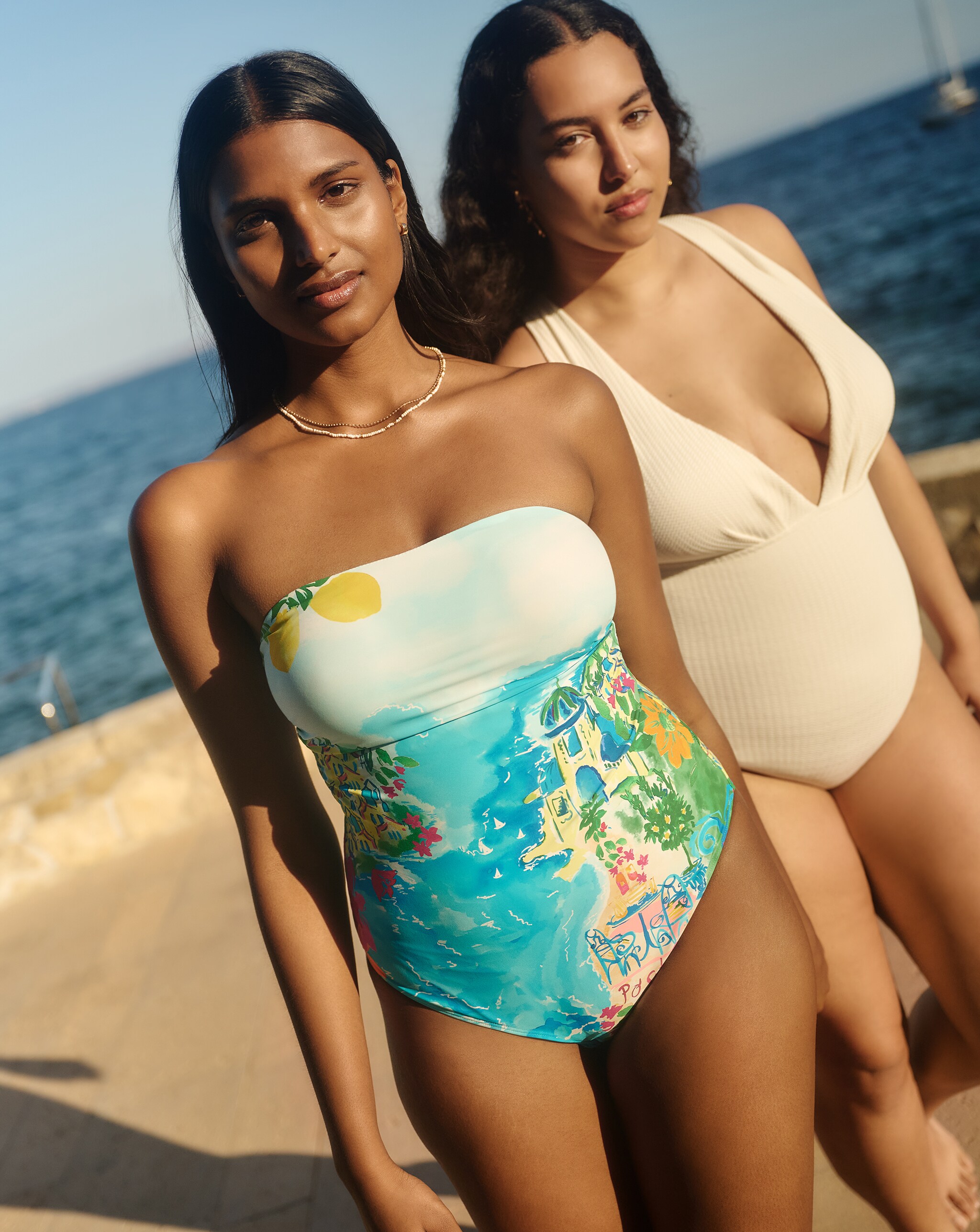 Two models wear new season swimwear