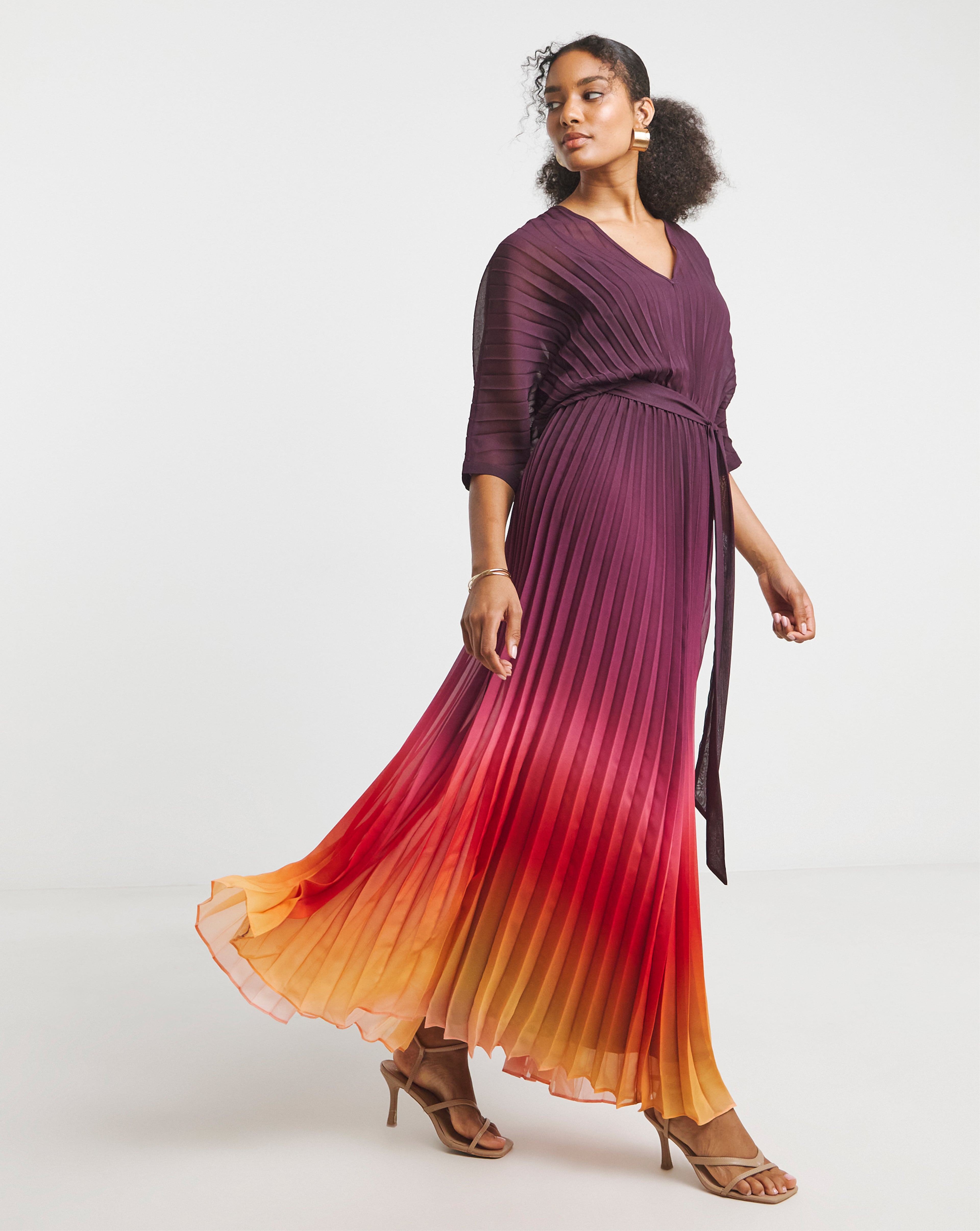Model wears multi-colour maxi dress in 