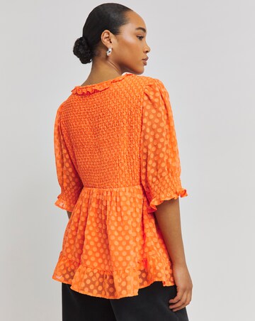 Hot Orange Shirred Frill Dobby Peplum Top