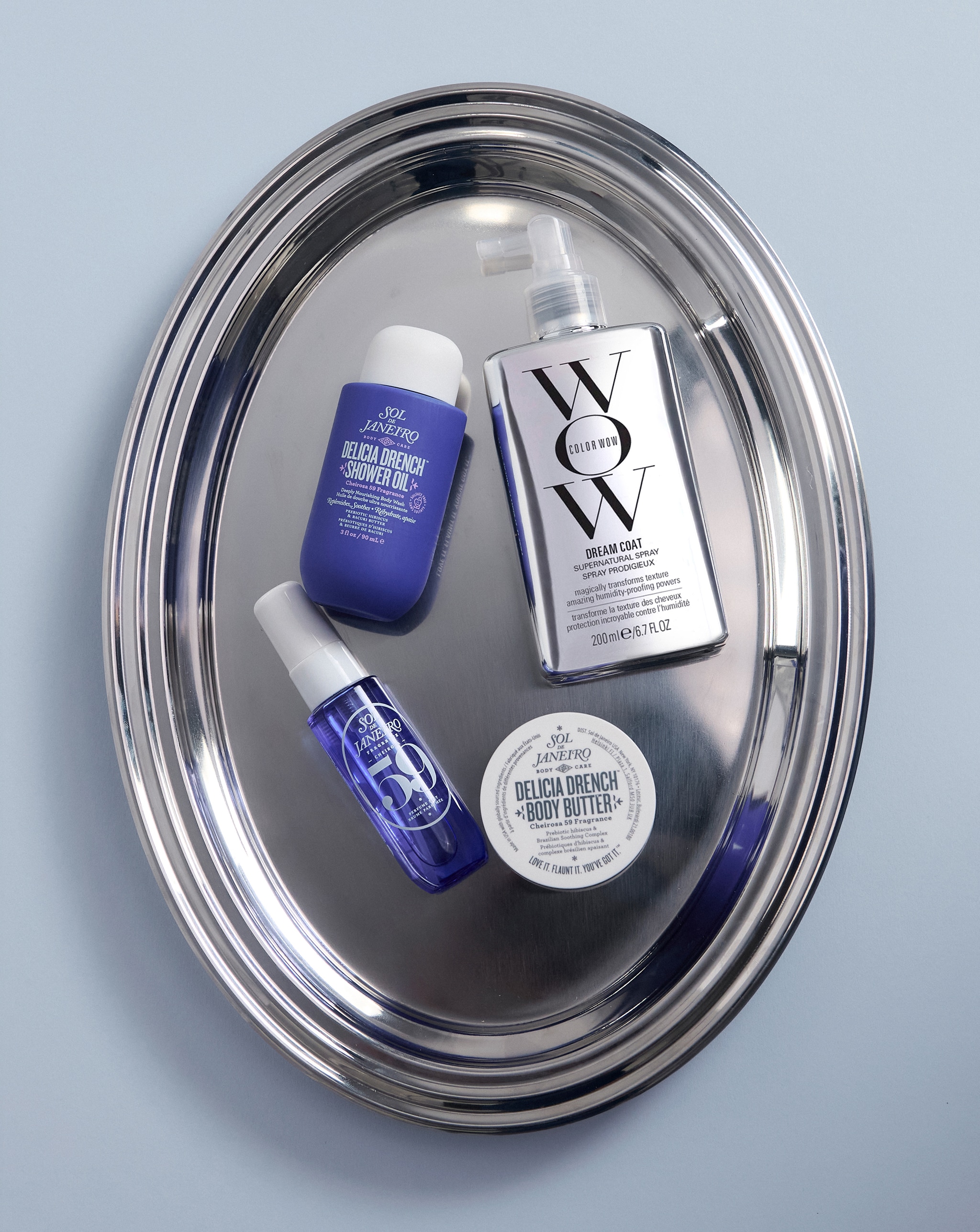 Various beauty products on a silver tray