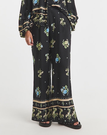 Simply Be Black Floral Border Print Wide Leg Trousers