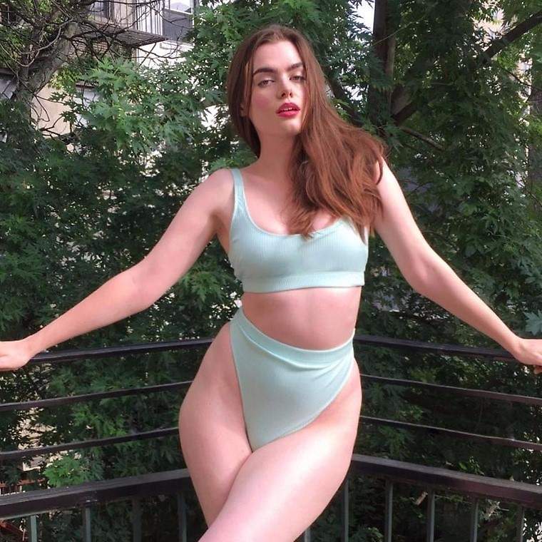 Charli Howard wearing a mint green bikini