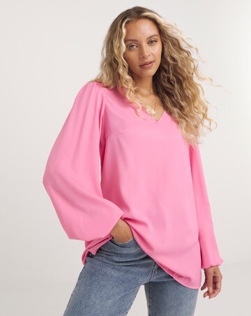pink v neck long sleeve top