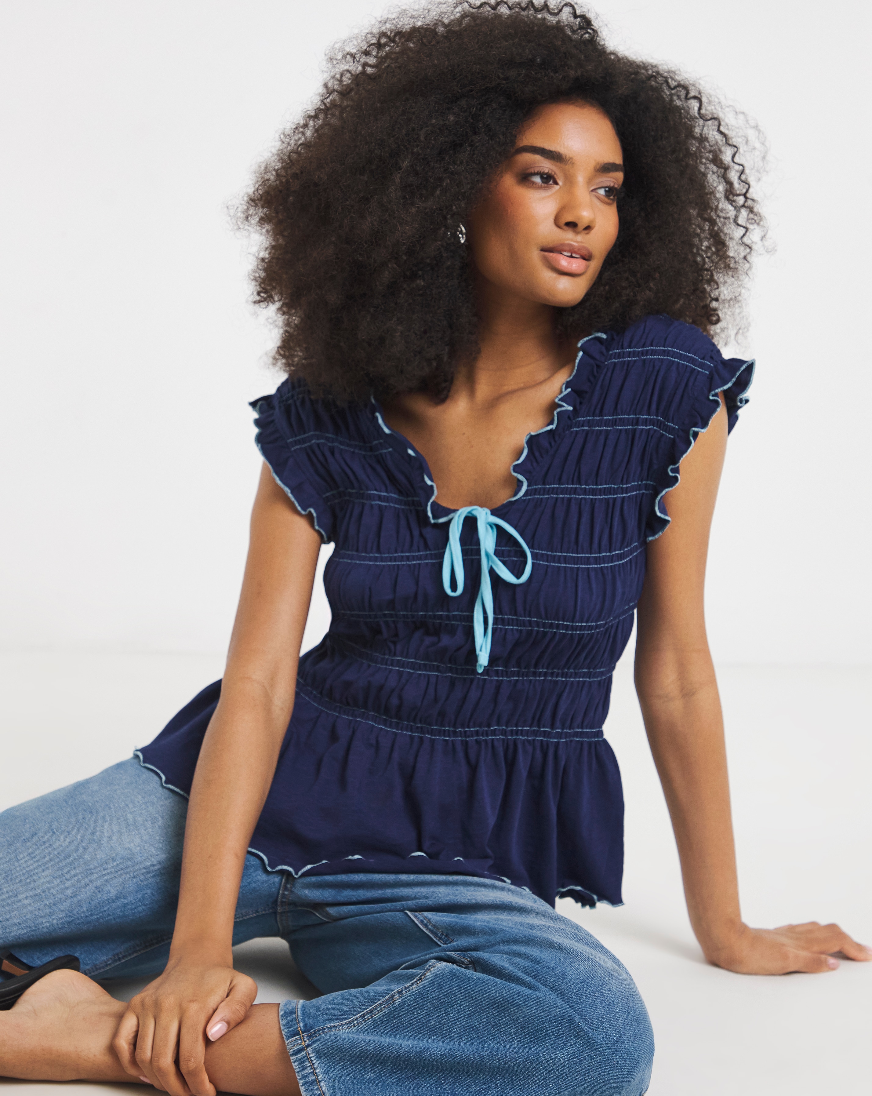 New In - Shirred Peplum V Neck Top