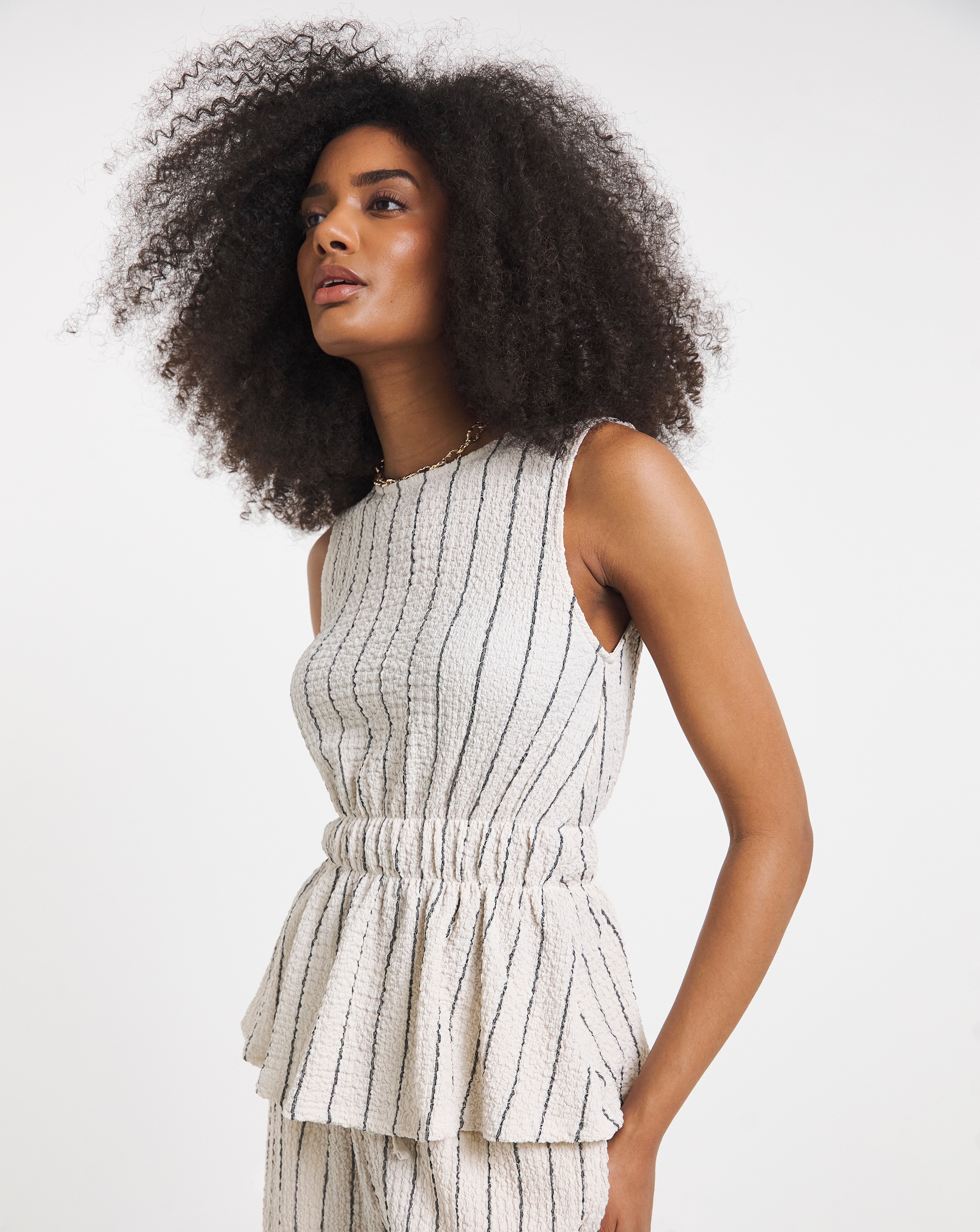 New In - Stripe Peplum Top