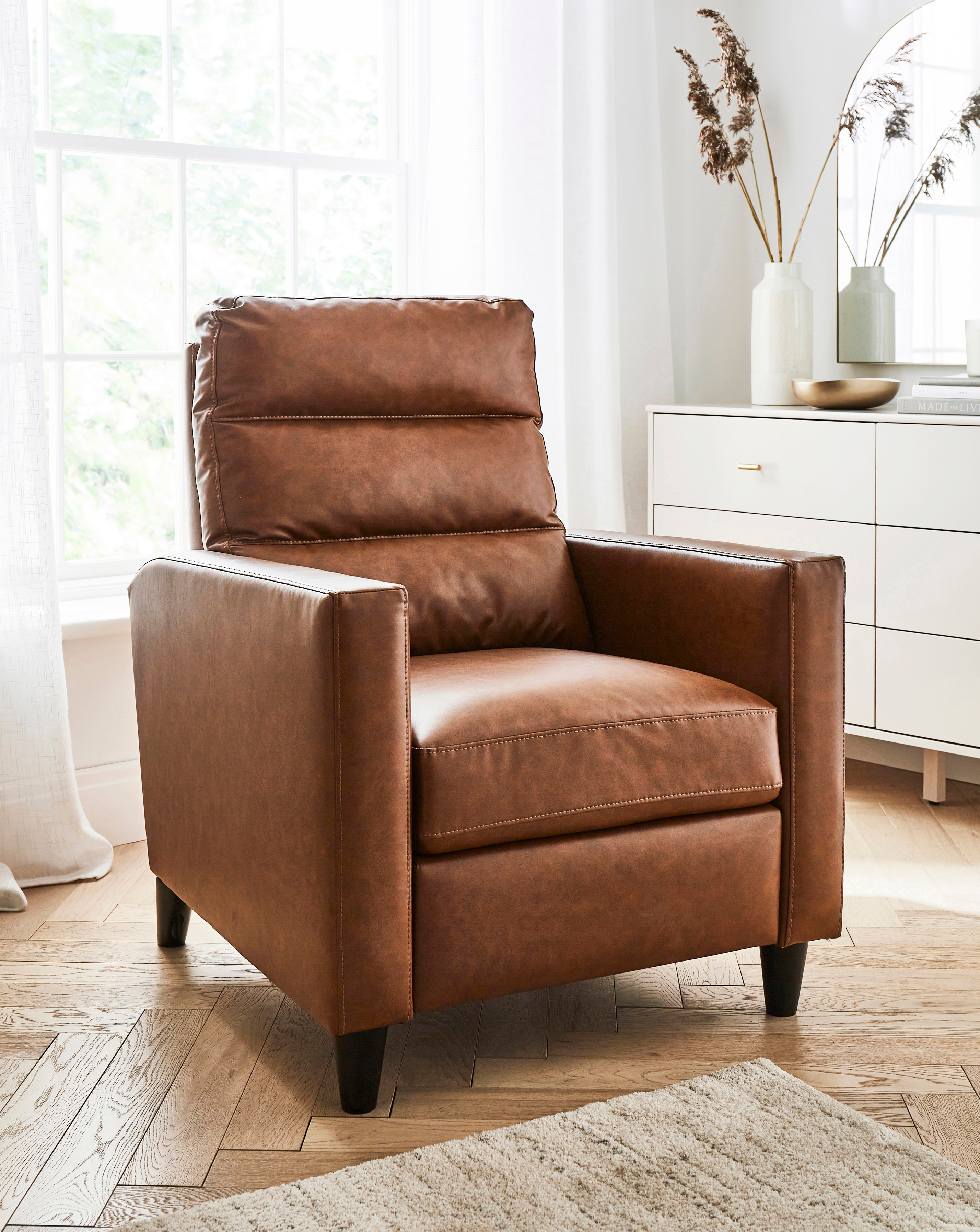 New In - Sutton Faux Leather Recliner Armchair
