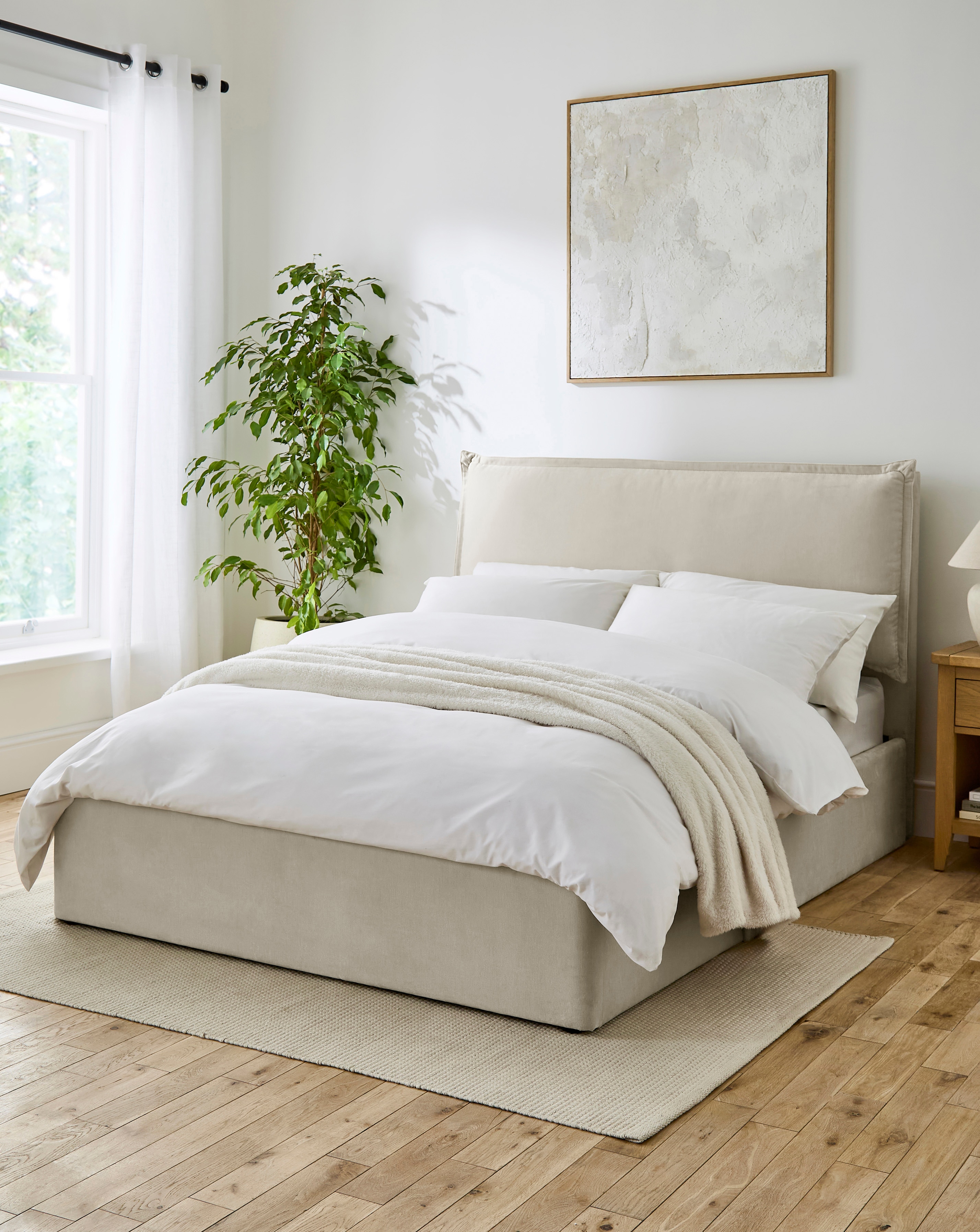 Naya Pillowback Fabric Ottoman Bed