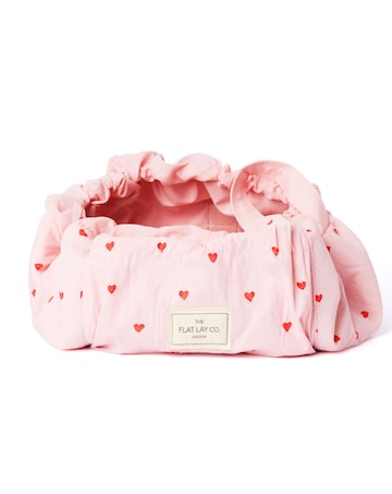 The Flat Lay Co.Marshmallow Drawstring Makeup Bag in Pink Hearts