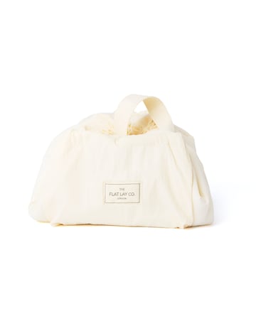 The Flat Lay Co.Marshmallow Drawstring Makeup Bag in Vanilla