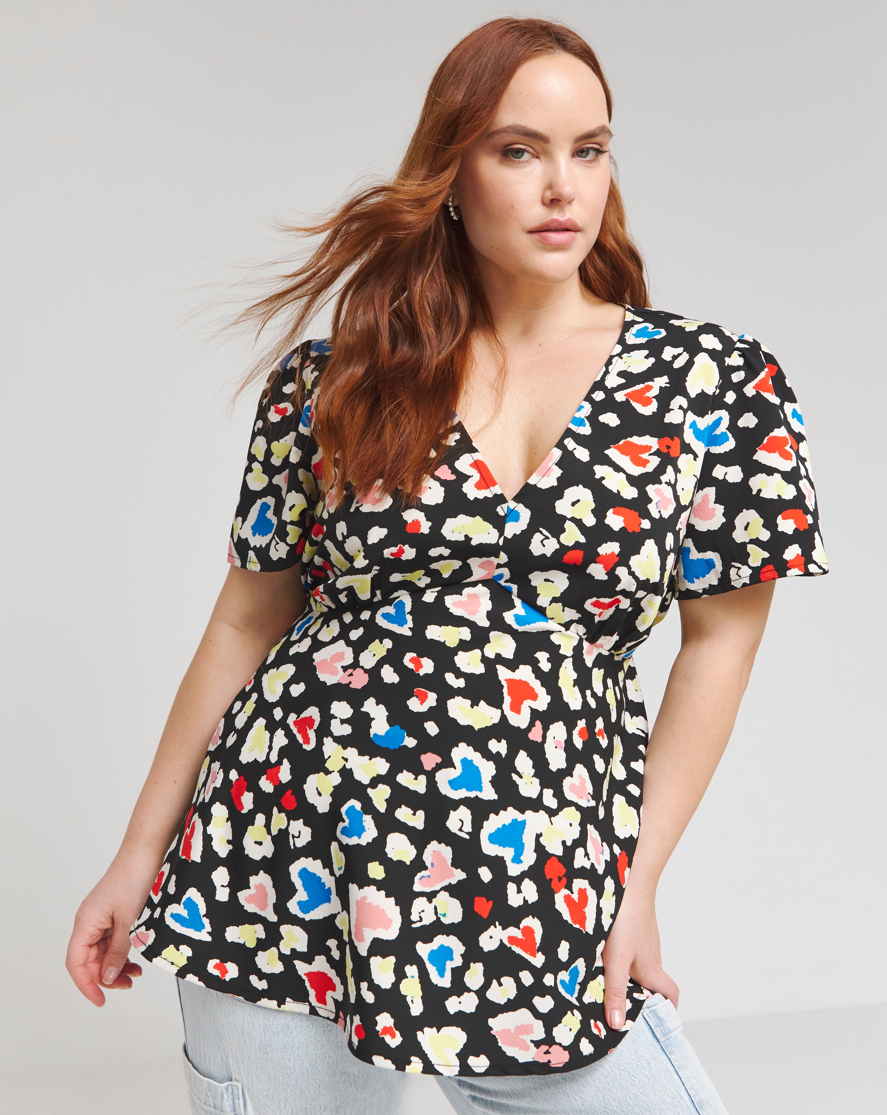 Animal Print V Neck Tea Blouse